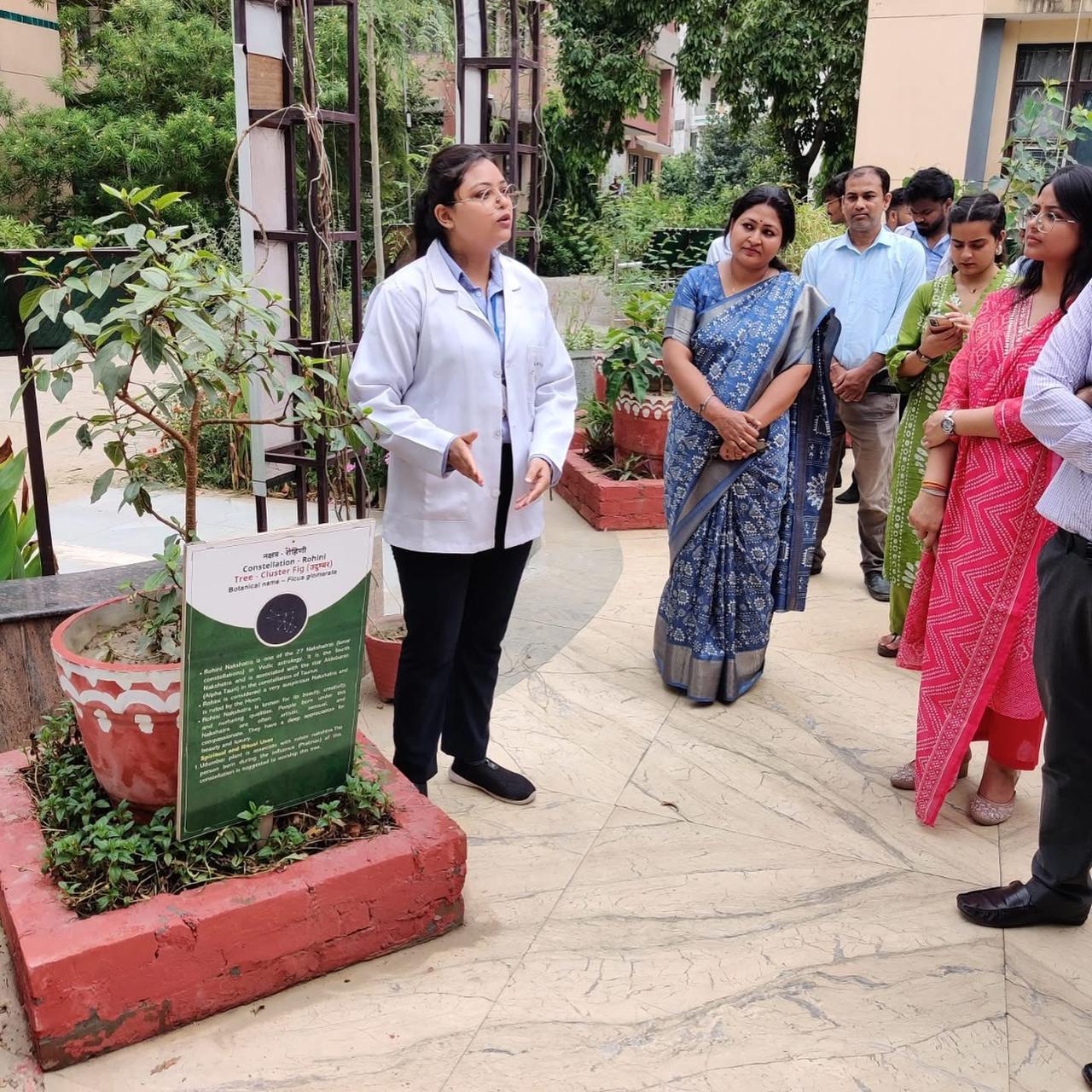 Researchers working with microscope